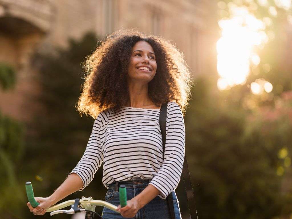 woman-with-bike-The-Period-Revolution-Transforming-Your-Life-One-Cycle-at-a-Time
